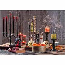 LOS MUERTOS AND BLEEDING CANDLES