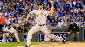 Madison Bumgarner of the San Francisco Giants pitches in the first inning against the Kansas City Royals during Game 1 of the 2014 World Series on Tuesday in Kansas City, Mo.