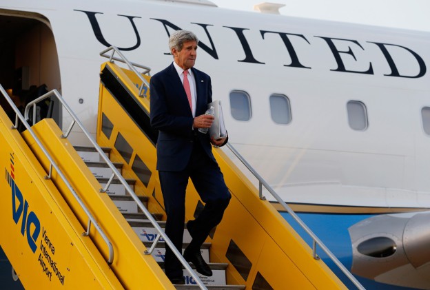 U.S. Secretary of State John Kerry disembarks from his plane after arriving at Vienna International Airport on July 13, 2014. Kerry landed in Austria early on July 13 to help steer the final stretches of negotiations between global powers and Iran over Tehran's suspect nuclear program, as a deadline for a deal looms. (Jim Bourg/AFP/Getty Images)