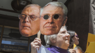 The Koch brothers, David and Charles, on a protest sign