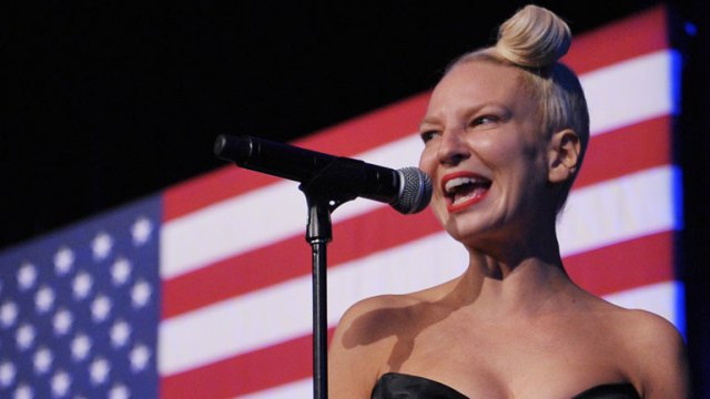 Sia smiles as she finishes her performance at the Democratic National Committee LGBT Gala (MANDEL NGAN/AFP/Getty Images)