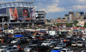 DENVER, CO - SEPTEMBER 5: Fans tailgate outside of Sports Authority Field at Mile High prior to the game between the Denver Broncos and the Baltimore Ravens on September 5, 2013 in Denver Colorado.
