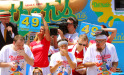 NEW YORK, NY- JULY 04: (L to R) Tim Janus, Joey Chestnut, Matt Stonie and Bob Shoudt compete in the Nathan's Famous Fourth of July Hot Dog Eating Contest at Nathan's Famous in Coney Island on July 4, 2013 in the Brooklyn borough of New York City. Chestnut, of San Jose, California, ate 69 hotdogs in ten minutes to win his seventh straight title.