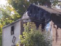 One firefighter was killed and three injured in a fire at a house on Blue Hills Avenue in Hartford. Photo by WTIC's Matt Dwyer.