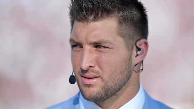 Tim Tebow of the SEC Newtork on the field before a game. (credit: Grant Halverson/Getty Images)