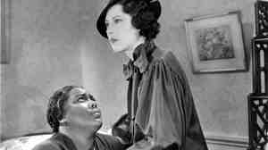 In the 1934 film Imitation of Life, Fredi Washington (right) plays the role of Peola, an African-American woman who decides to pass as white.