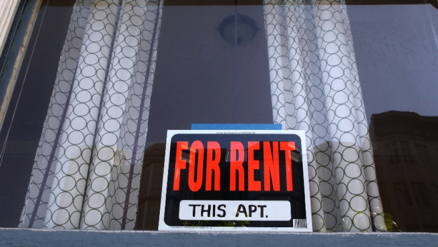 A sign advertising an apartment for rent is displayed in a window in San Francisco. (Justin Sullivan/Getty Images)