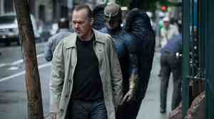 In Birdman, Michael Keaton (a real-life former Batman) plays a former movie superhero who's trying to get a grasp on his career.