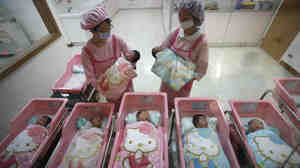 Nurses check on newborns in the Hello Kitty-designed maternity ward at the Hau Sheng Hospital in Taiwan in 2009.