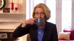 In this campaign ad, GOP candidate Terri Lynn Land sips coffee after asking the viewer to "think about" accusations that she's waging a war on women.