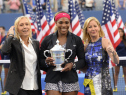 Serena Williams with her trophy poses with Martina Navratilova (L) and Chris Evert (R) after she wins over Caroline Wozniacki of Denmark at the 2014 US Open Women's Singles finals match at the USTA Billie Jean King National Tennis Center on September 7, 2014. (Photo credit should read TIMOTHY A. CLARY/AFP/Getty Images)