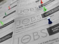 Job listings are posted on a bulletin board at a career center. (credit: Getty Images/Justin Sullivan)
