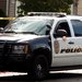 A police vehicle guarded a home Friday in Tallmadge, Ohio, where Amber Joy Vinson, a health care worker, stayed during her visit to the area.