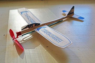 Balsa-wood glider handed out at Texas A&M-Corpus Christi celebration of FAA announcement.