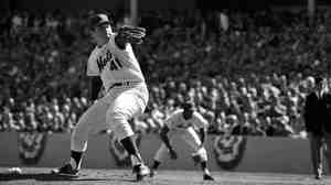 Tom Seaver of the New York Mets pitches in the fourth game of the 1969 World Series.