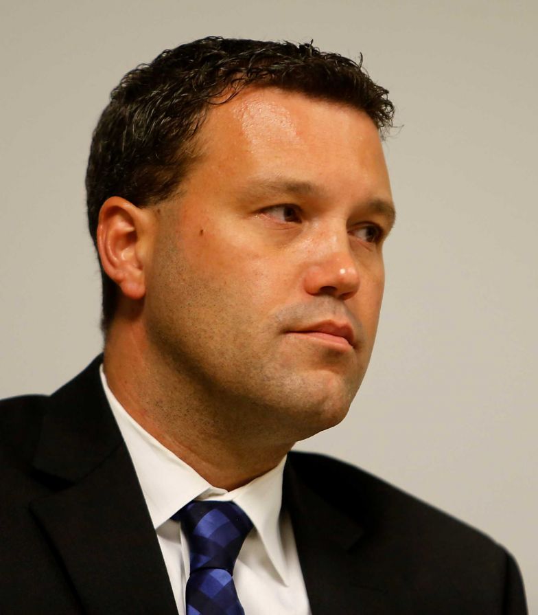 Former Houston homicide detective Sgt. Ryan Chandler during a two-day hearing to try and win his job back after HPD Chief Charles McClelland fired Chandler and disciplined seven others in early April, after a lengthy internal affairs investigation found Chandler failed to go to crime scenes, didn't interview witnesses, and took years to update case files Tuesday, Aug. 19, 2014, in Houston.

( James Nielsen / Houston Chronicle )