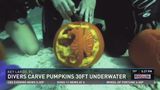 Divers carve pumpkins 30 ft underwater