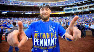 Outfielder Alex Gordon of the Kansas City Royals celebrates the team's Game 4 win over the Baltimore Orioles, which completed a sweep of the American League Championship Series, at Kauffman Stadium in Kansas City, Mo., on Wednesday.