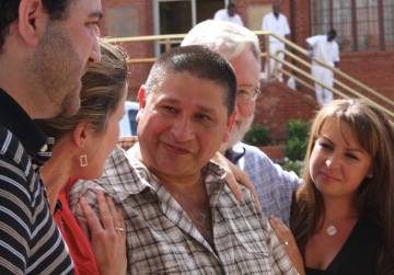 Manuel Velez and his legal team celebrate his first moments of freedom.
