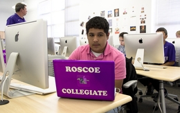 A high school student in Roscoe ISD, which has provided a laptop for every student with money from wind farm subsidies.