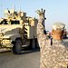 US soldiers waved at their comrades as they crossed the border between Iraq and Kuwait aboard the last US military convoy carrying troops from Iraq marking the end of the presence of US army in Iraq on Sunday.