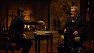 Justin Long and Michael Parks conduct an initial interview before things get hairy in "Tusk."