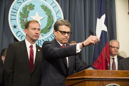 Texas Sen. Dr. Charles Schwertner, R-Georgetown, and Texas Gov. Rick Perry at a Capitol press conference on Monday announcing creation of a Texas infectious disease task force.