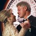 Hillary Rodham Clinton, dressed in an Oscar de la Renta dress, with her husband at a 1997 inaugural ball.