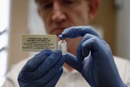 A vial containing a vaccine for Ebola. Plans to test several new ones suggest a response to the outbreak is gathering steam.