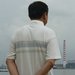 A still from the film showing Ho Juan Thai, a former student leader, looking at Singapore from Malaysia.