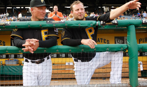 Evan Meek #47 and bench coach Jeff Banister #17 of the Pittsburgh Pirates  (Photo by Jared Wickerham/Getty Images)