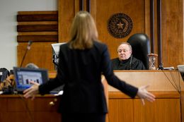 Shelley Dahlberg, an assistant attorney general, spoke to District Court Judge John Dietz of Austin on on Feb. 3, 2013, during closing arguments of a trial challenging the state's school finance system.