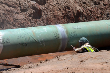 TransCanada worker welds section of Keystone XL pipeline near Winnsboro.