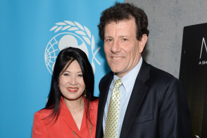 Authors Nicholas Kristof and wife Sheryl WuDunn attend the premiere of "Meena" at the AMC Loews Theater on Thursday, June 26, 2014 in New York.