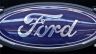 This Feb.16, 2012 photo shows the Ford logo at the 2012 Pittsburgh Auto Show. U.S. safety regulators are investigating complaints that the accelerators can stick in Ford Tauruses from the 2005 and 2006 model years. (AP Photo/Gene J. Puskar)