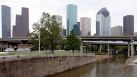 HOUSTON - SEPTEMBER 14:  A few low lying areas surrounding Downtown houston are still  flooded from Hurricane Ike September 14, 2008 in Houston, Texas. Ike caused extensive damage along the Texas Gold Coast, leaving millions without power.