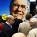 An image of Warren Buffett loomed at Berkshire Hathaway’s annual shareholders meeting in 2013. Mr. Buffett is vastly better known than his company is.