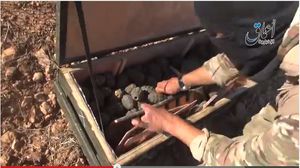 Video allegedly showing Islamic State militants rifling through a box of U.S.-supplied grenades intended for Kurdish fighters.
