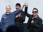 Bono and Apple CEO Tim Cook announced U2's surprise new album at the iPhone 6 launch