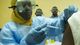 epa04439976 A volunteer recieves the ebola vaccination
