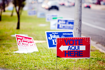 vote-here-austin-signs-march-2014