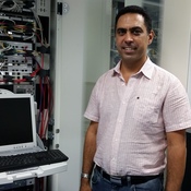 Ramzi El-Fekih, CEO of Creova, stands in his server room in Tunis. He has built a mobile payments company, but because of banking restrictions, Tunisians can use his product only for domestic purchases.