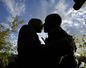 AP PHOTOS: Joy, confusion at gay marriage rulings