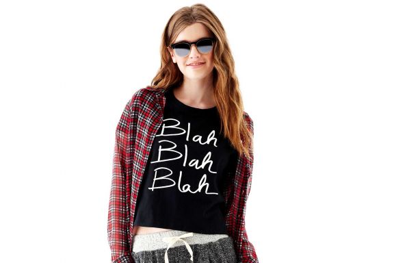 A grunge-inspired look from JCPenney: black "Blah Blah" tee, $28, red and black striped plaid button down, $46, gray drawstring sweatpants $46, black lace up boot, $54.99, all by Olsenboye.