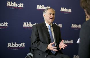 Republican Gubernatorial candidate, Greg Abbott, speaks one-on-one with members of the media following his his appearance at a Congress Ave. coffee house on July 10th, 2014