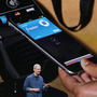 Apple CEO Tim Cook speaks in Cupertino, Calif., on Tuesday. The company unveiled a new mobile payment system called Apple Pay, which uses security built into the latest iPhones.