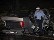 Philadelphia police on the scene of a deadly car crash on the 5900 block of City Avenue on Oct. 22, 2014. (Alejandro A. Alvarez / staff)