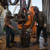 Workers drill for oil in the Bakken shale formation outside Watford City, N.D., an area experiencing an oil boom.