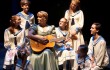 Marissa McGowan (center) teaches kids their scales in The Sound of Music.