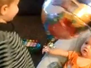 Babies Share Big Laughs Over Balloon